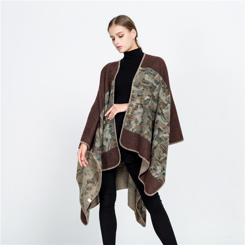 Ladies Oversize Ruana Cape made of wool blend with geometric jacquard trim Mune Fashion