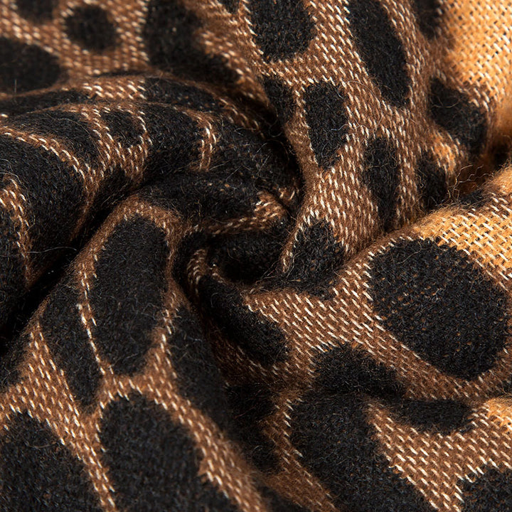 Women’s poncho overlay in oversized with leopard jacquard and overlock seam