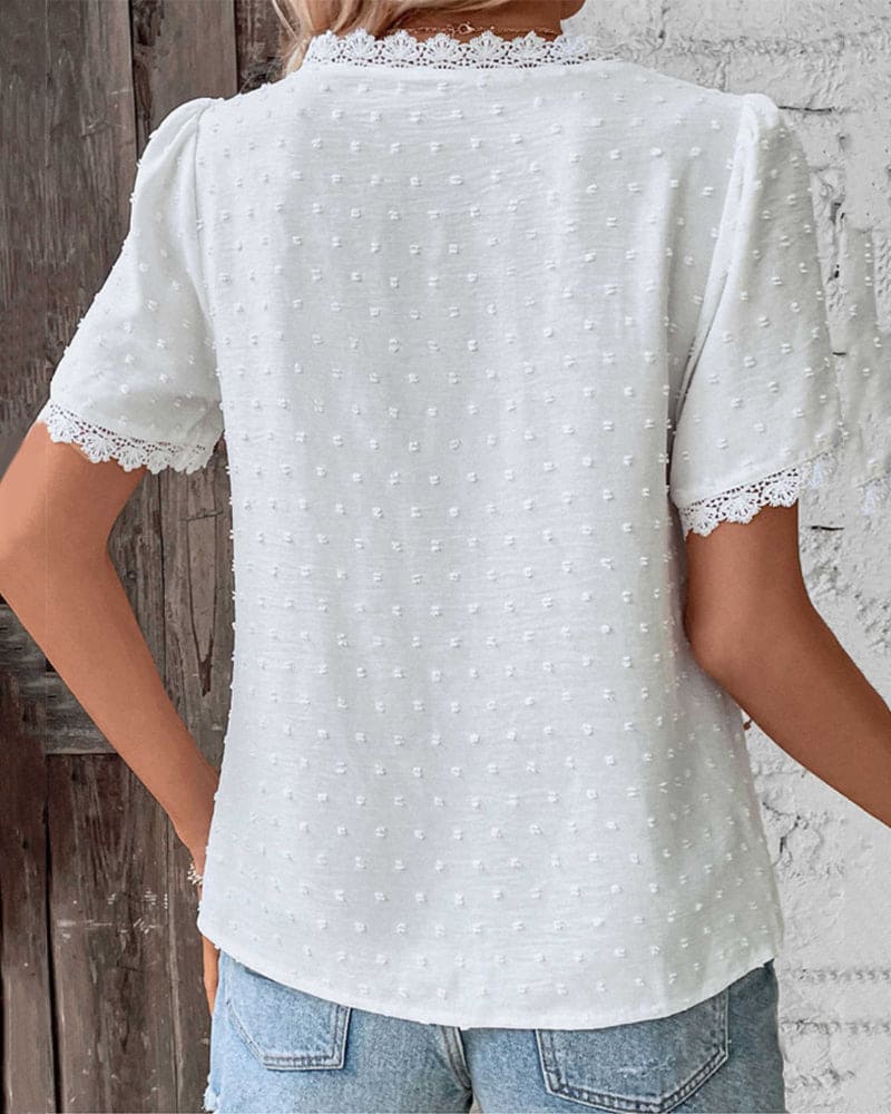 Ladies short-sleeve blouse with V neck and ruffled sleeves