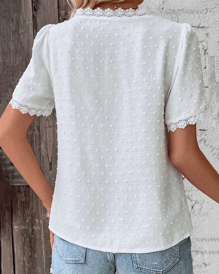 Ladies short-sleeve blouse with V neck and ruffled sleeves