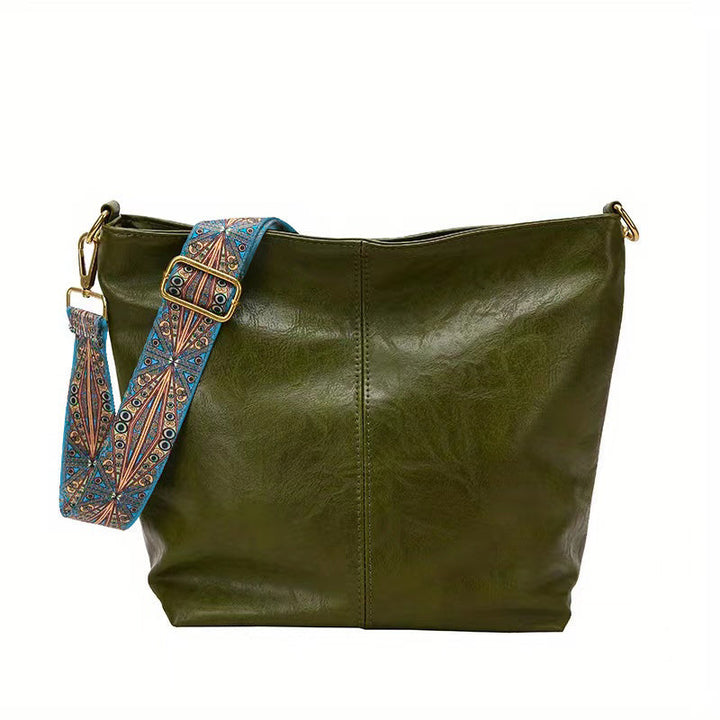 Mune Fashion - Chic tote bag with embellished strap