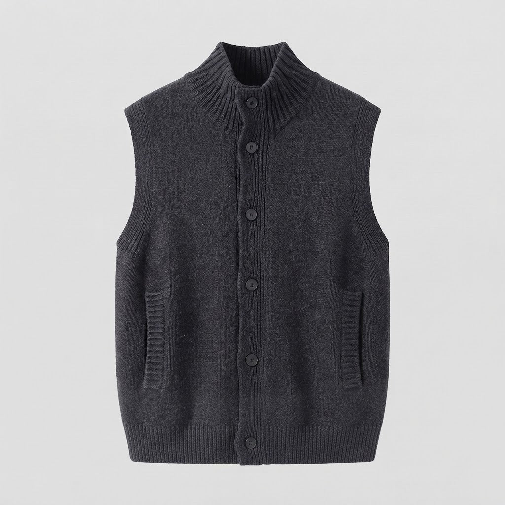 Women's sleeveless structured knit vest with high ribbed collar, concealed button placket and inset pockets Mune Fashion