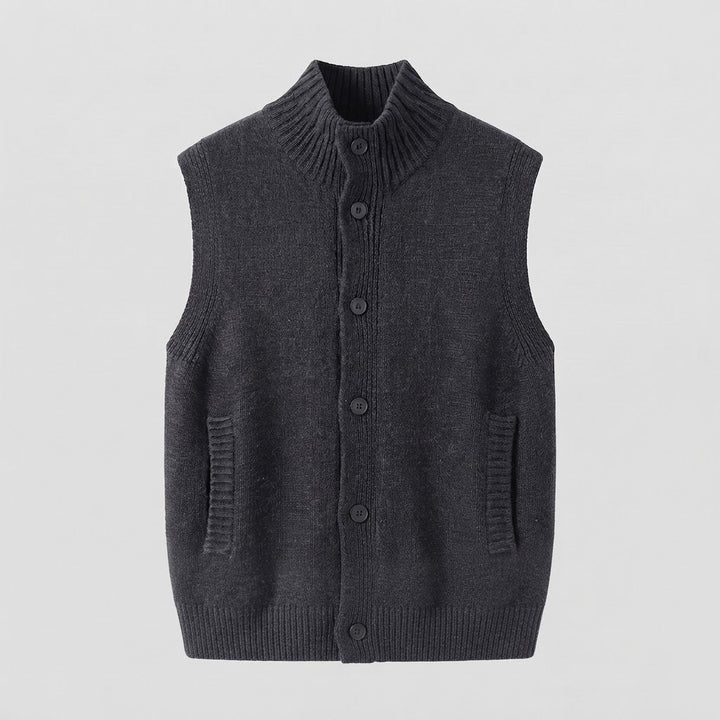 Women's sleeveless structured knit vest with high ribbed collar, concealed button placket and inset pockets Mune Fashion