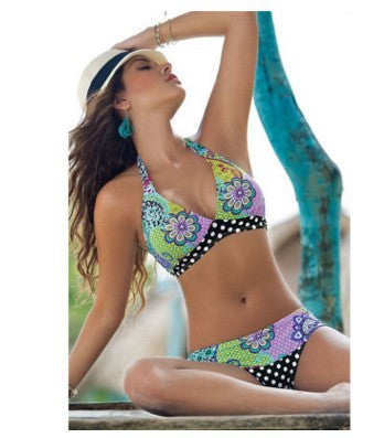 Women's triangle bikini with vibrant floral pattern and polka dot bottom Mune Fashion