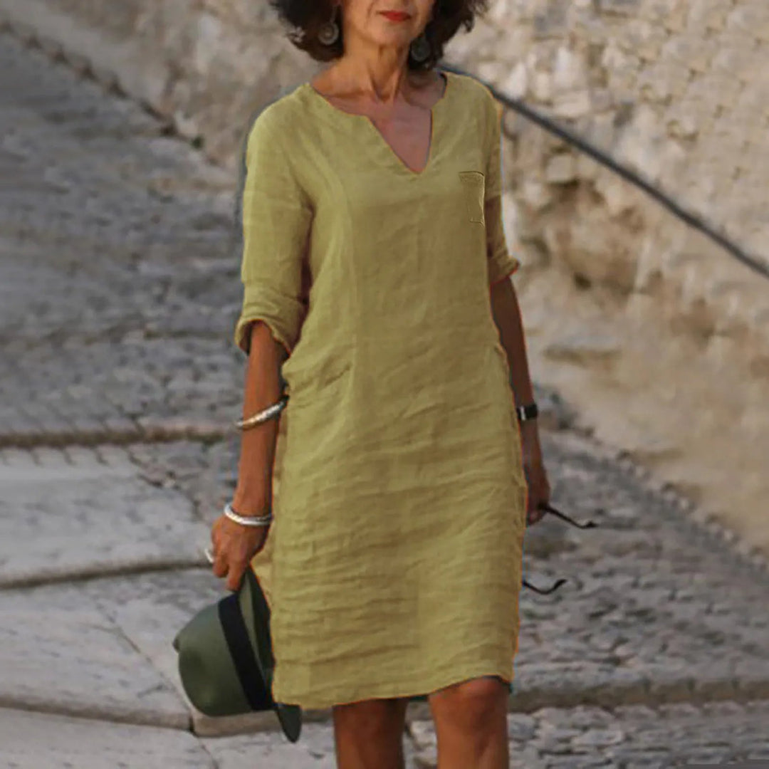 Linen shift dress with V-neck and pockets