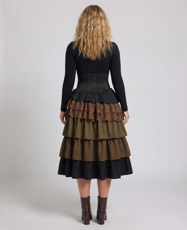 Ladies Elegant layered skirt with elaborate ruffles and decorative buttons Mune Fashion