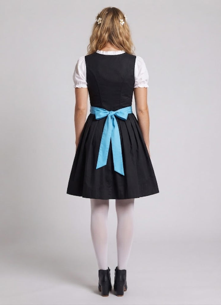 Women's traditional dress with floral design and ruffle details Mune Fashion