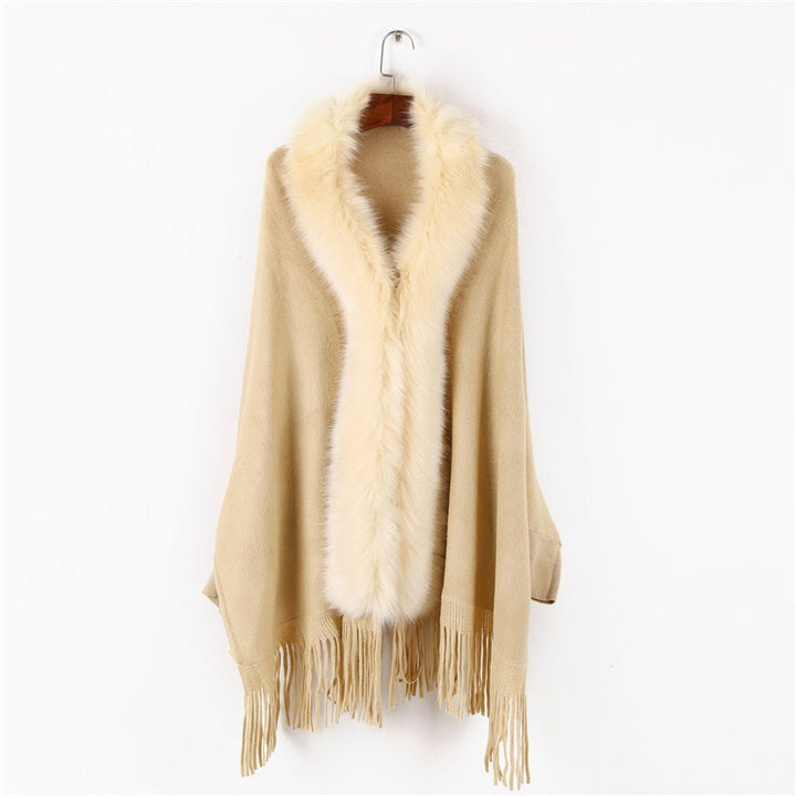 Women's poncho with faux fur collar and fringes Mune Fashion