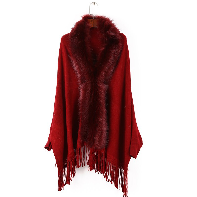 Women's poncho with faux fur collar and fringes Mune Fashion