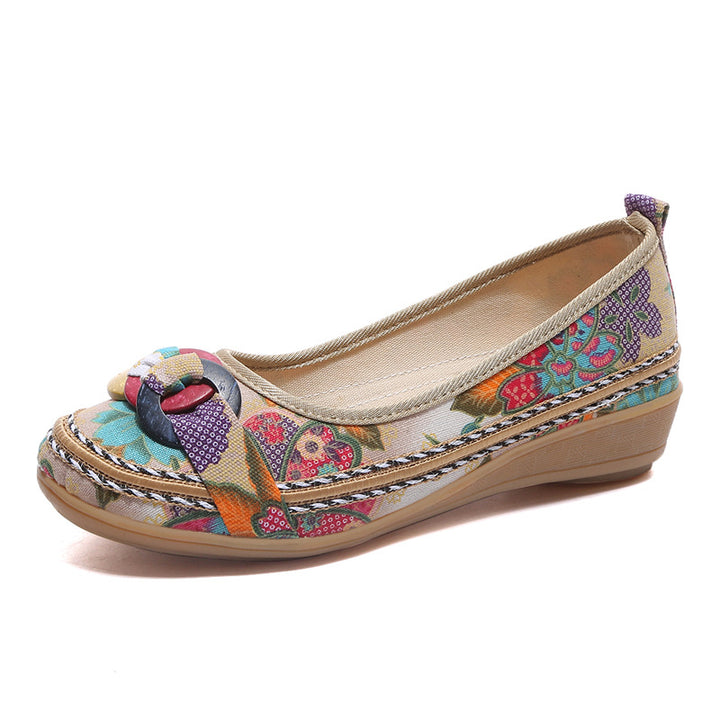 Women's floral textile slippers with low wedge heel, decorative ring application and cushioned comfort footbed Mune Fashion