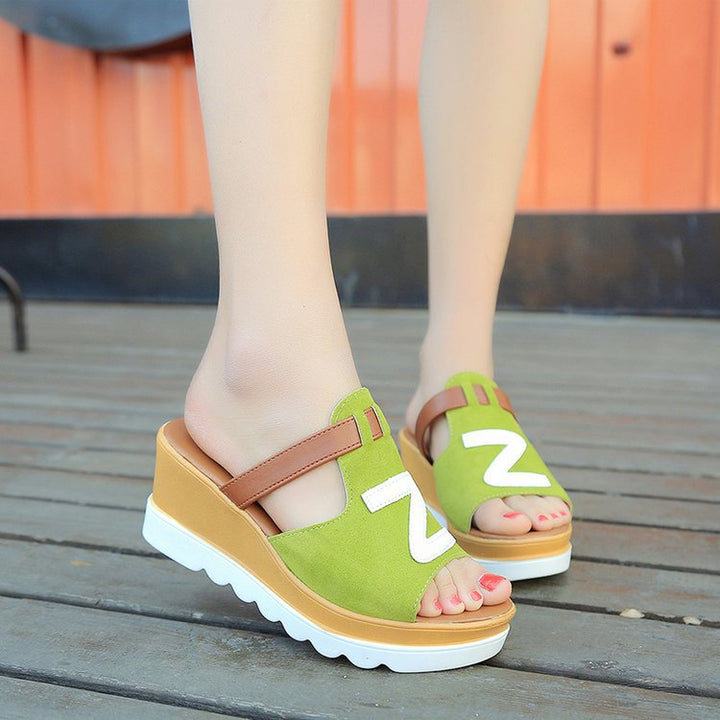 Women slip-on wedge sandals with ergonomic wave sole, padded comfort footbed, and decorative logo application Mune Fashion