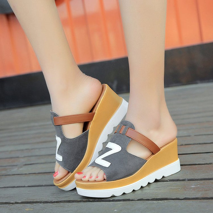 Women slip-on wedge sandals with ergonomic wave sole, padded comfort footbed, and decorative logo application Mune Fashion
