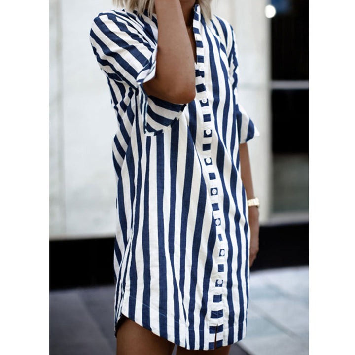 Women's striped tunic-mini dress with full button placket, three-quarter ruffled sleeves, and front slit Mune Fashion