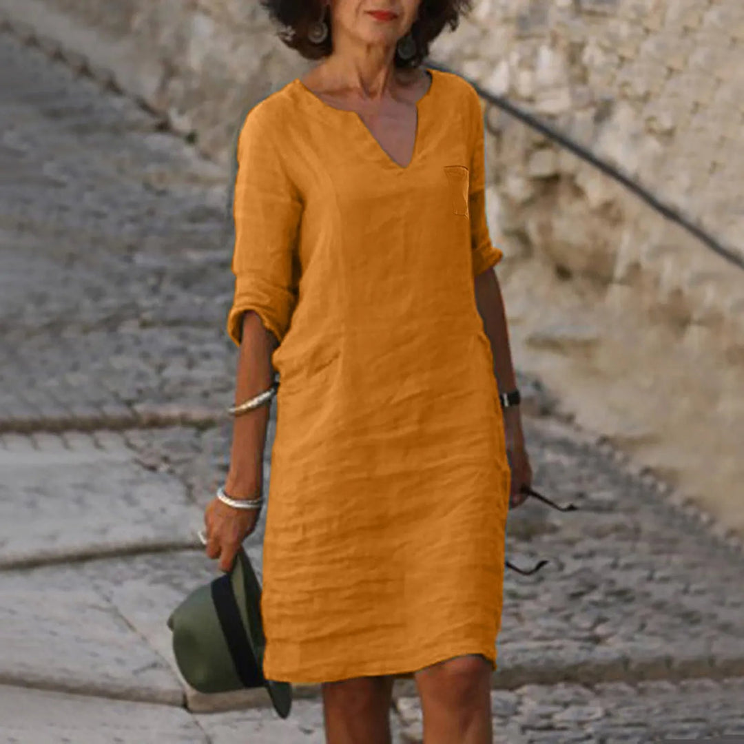 Linen shift dress with V-neck and pockets