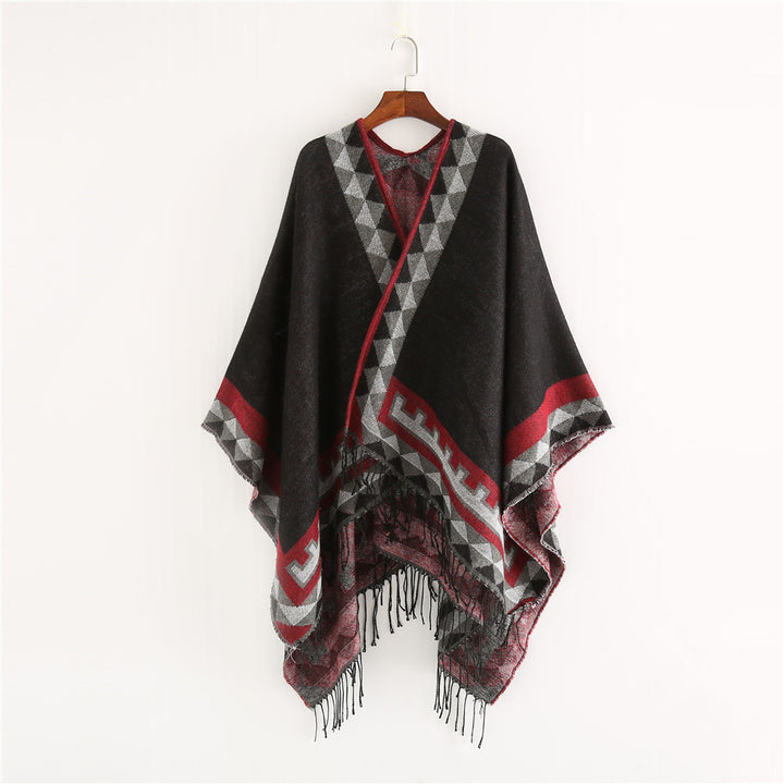 Women chunky knit poncho in wrap style with triangle jacquard and fringe hem Mune Fashion