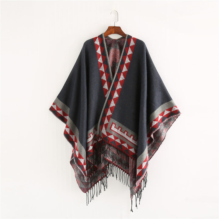 Women chunky knit poncho in wrap style with triangle jacquard and fringe hem Mune Fashion
