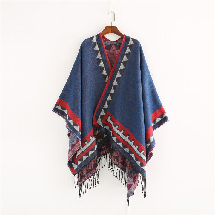 Women chunky knit poncho in wrap style with triangle jacquard and fringe hem Mune Fashion