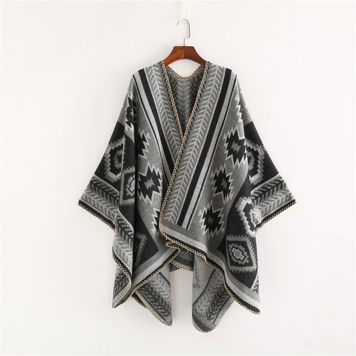 Women Ethno-Jacquard Ruana-Poncho with boxy oversized fit and decorative chain stitch.