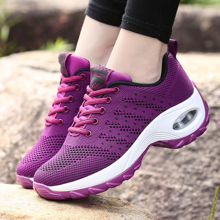 Women's lightweight mesh comfort sneakers with integrated air cushioning, padded heel collar, and springy wave sole Mune Fashion