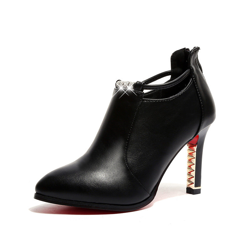 Women's elegant ankle-high boot with pointed shape, decorative strap, and gold-plated stiletto heel Mune Fashion