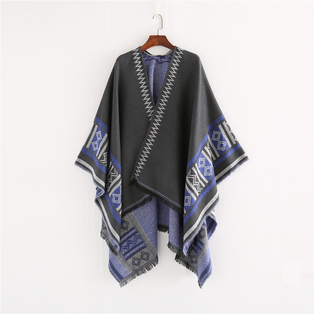 Women Oversize Ruana Poncho in Boho Ethno Look made of wool blend with V-neck and fringe hem Mune Fashion