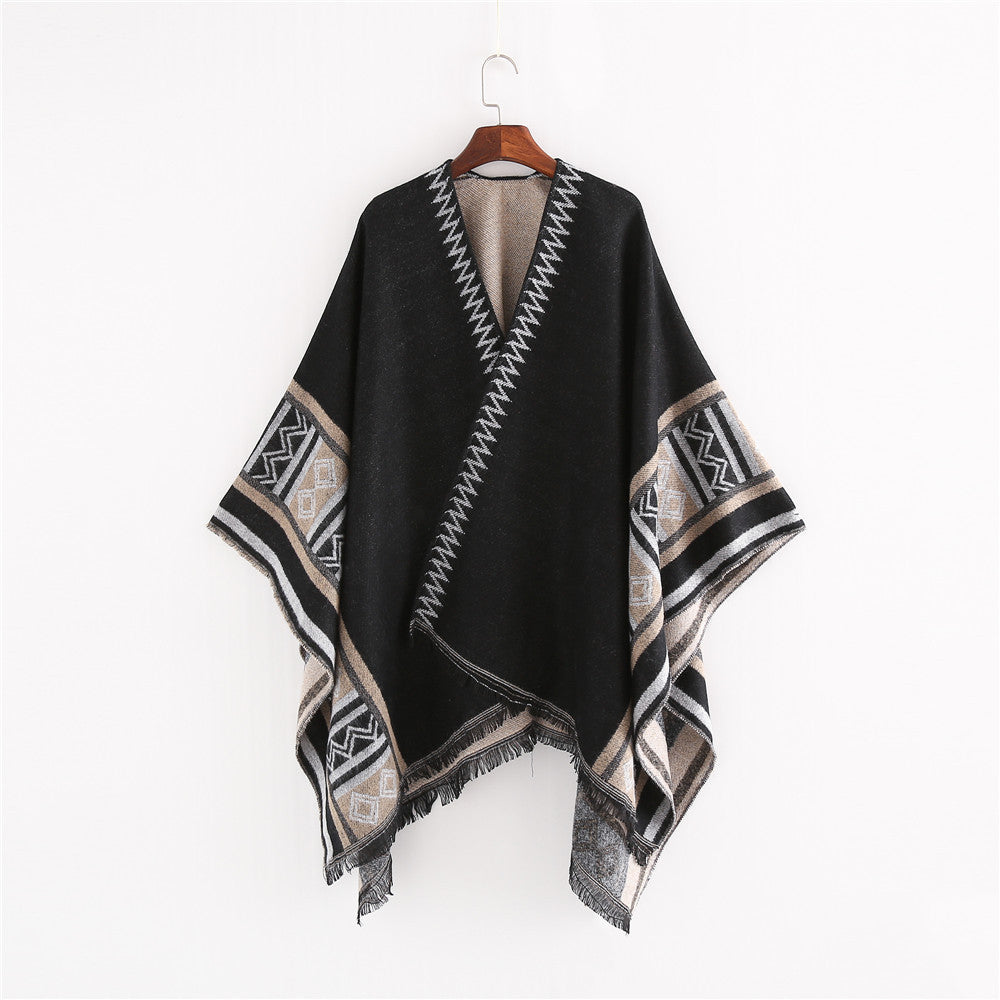 Women Oversize Ruana Poncho in Boho Ethno Look made of wool blend with V-neck and fringe hem Mune Fashion