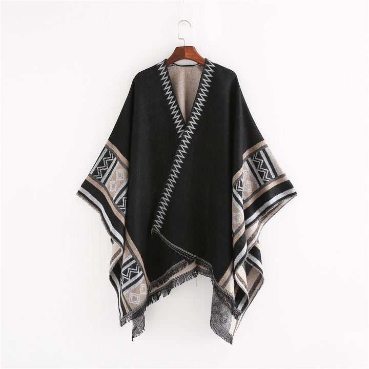 Women Oversize Ruana Poncho in Boho Ethno Look made of wool blend with V-neck and fringe hem Mune Fashion