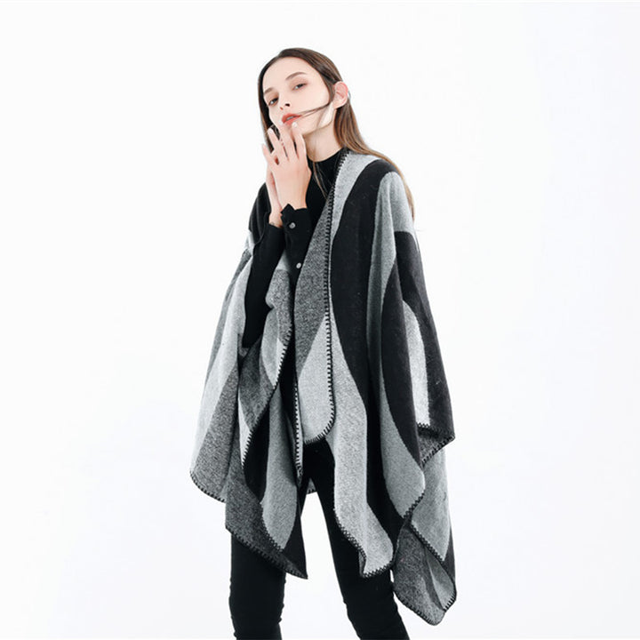 Women Soft-Falling Cape Overlay in Oversized Ruana Style with Contrasting Round Surfaces and Decorative Chain Stitching.