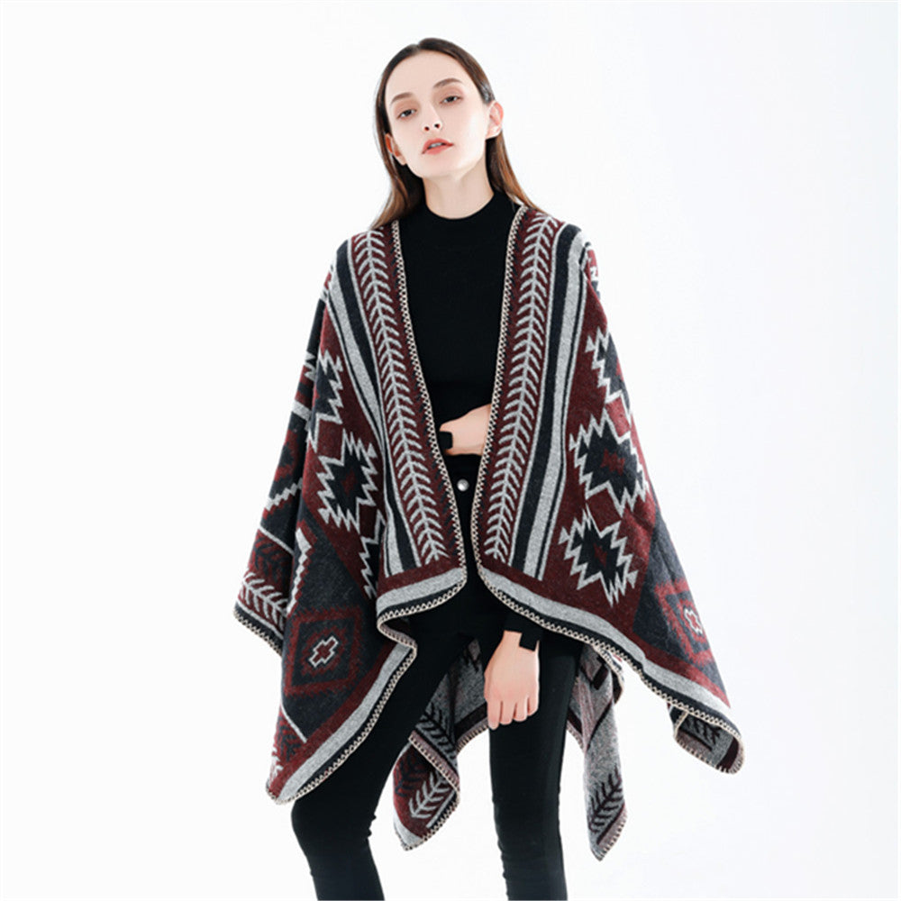 Women Ethno-Jacquard Ruana-Poncho with boxy oversized fit and decorative chain stitch.