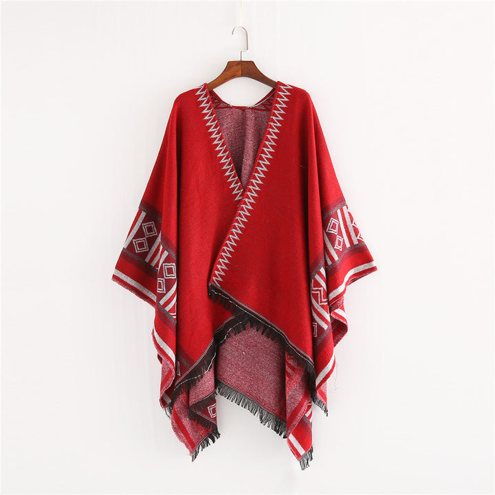 Women Oversize Ruana Poncho in Boho Ethno Look made of wool blend with V-neck and fringe hem Mune Fashion