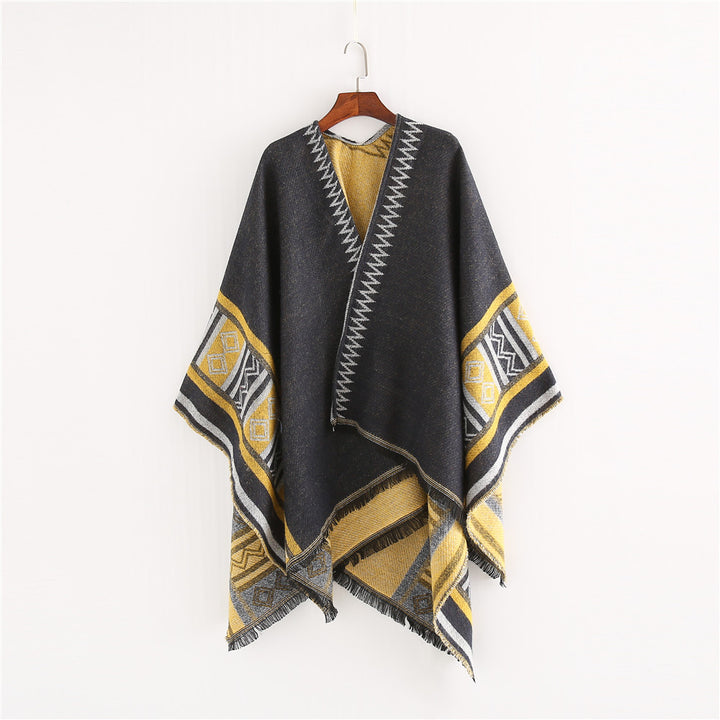 Women Oversize Ruana Poncho in Boho Ethno Look made of wool blend with V-neck and fringe hem Mune Fashion
