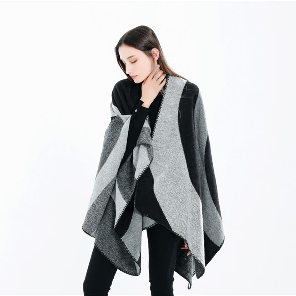 Women Soft-Falling Cape Overlay in Oversized Ruana Style with Contrasting Round Surfaces and Decorative Chain Stitching.