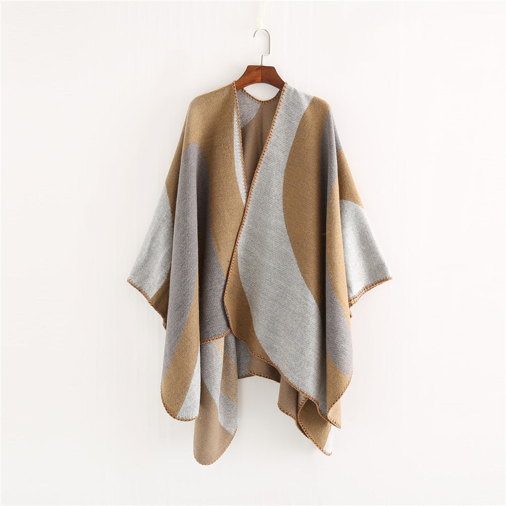 Women Soft-Falling Cape Overlay in Oversized Ruana Style with Contrasting Round Surfaces and Decorative Chain Stitching.