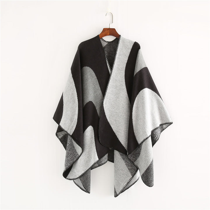 Women Soft-Falling Cape Overlay in Oversized Ruana Style with Contrasting Round Surfaces and Decorative Chain Stitching.