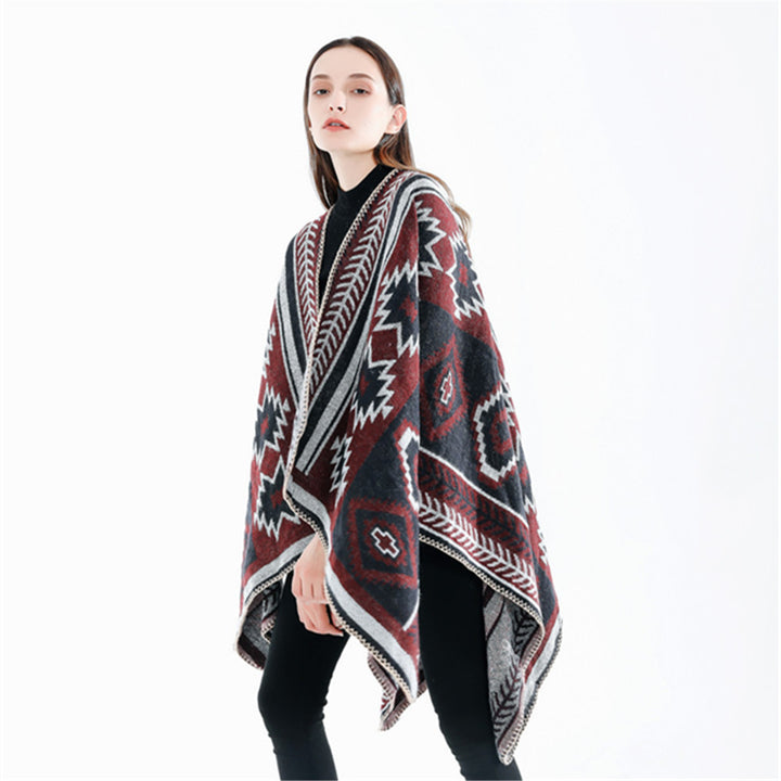 Women Ethno-Jacquard Ruana-Poncho with boxy oversized fit and decorative chain stitch.