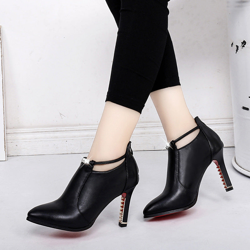 Women's elegant ankle-high boot with pointed shape, decorative strap, and gold-plated stiletto heel Mune Fashion