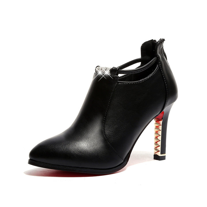 Women's elegant ankle-high boot with pointed shape, decorative strap, and gold-plated stiletto heel Mune Fashion
