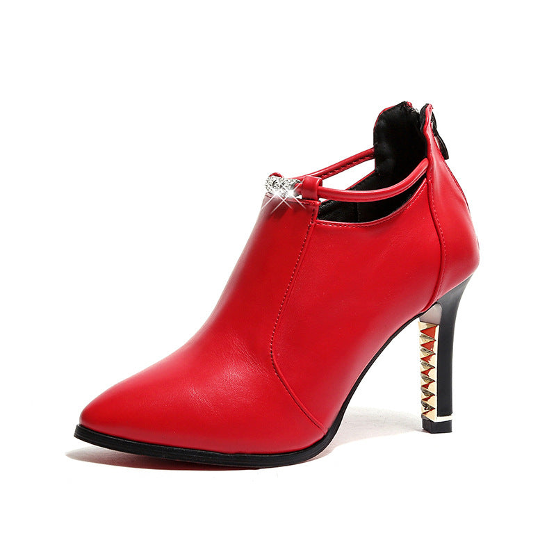 Women's elegant ankle-high boot with pointed shape, decorative strap, and gold-plated stiletto heel Mune Fashion