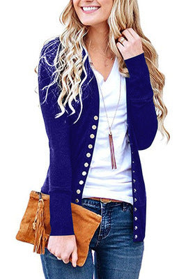 Women's fine knit cardigan with decorative metallic buttons and slim silhouette Mune Fashion