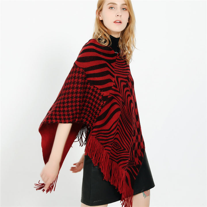 Women's fringe poncho in oversized with graphic jacquard and asymmetrical pointed hem Mune Fashion