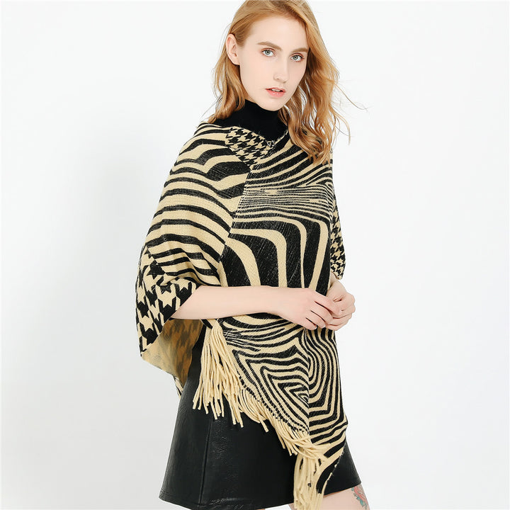 Women's fringe poncho in oversized with graphic jacquard and asymmetrical pointed hem Mune Fashion