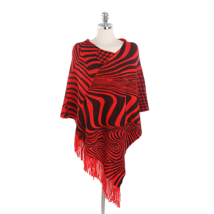Women's fringe poncho in oversized with graphic jacquard and asymmetrical pointed hem Mune Fashion