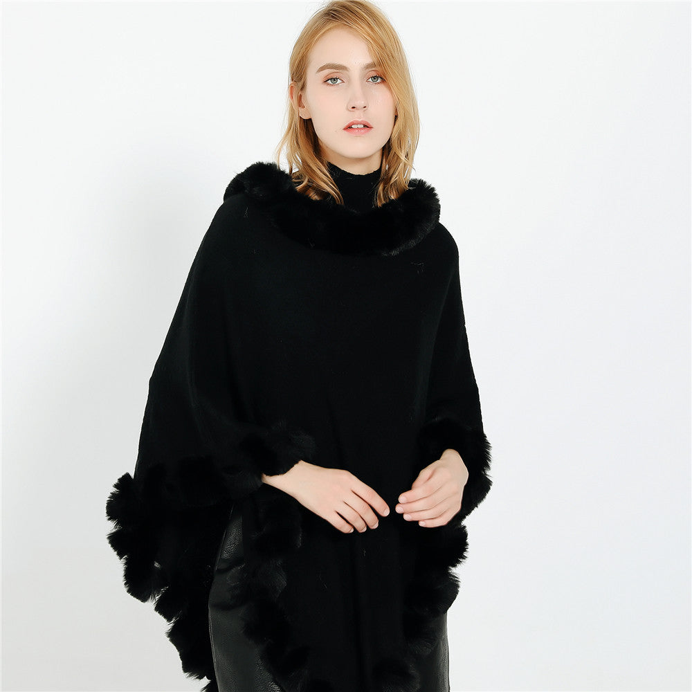 Women's cape poncho with faux fur collar and pom-pom trim Mune Fashion
