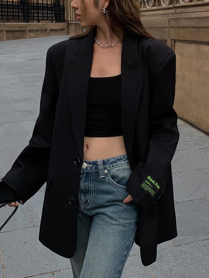 Mune | Oversized blazer with lapels and classic button closure