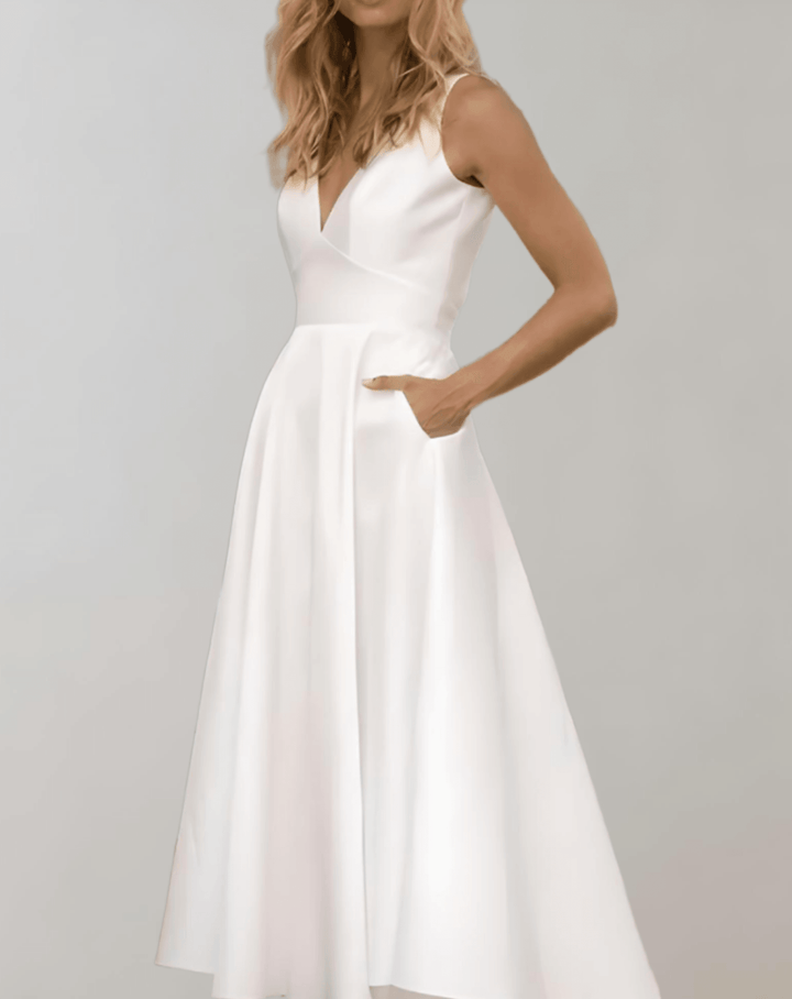 Mune Fashion | White Minimalist Bridal Dress With Deep V-Neck And Pockets