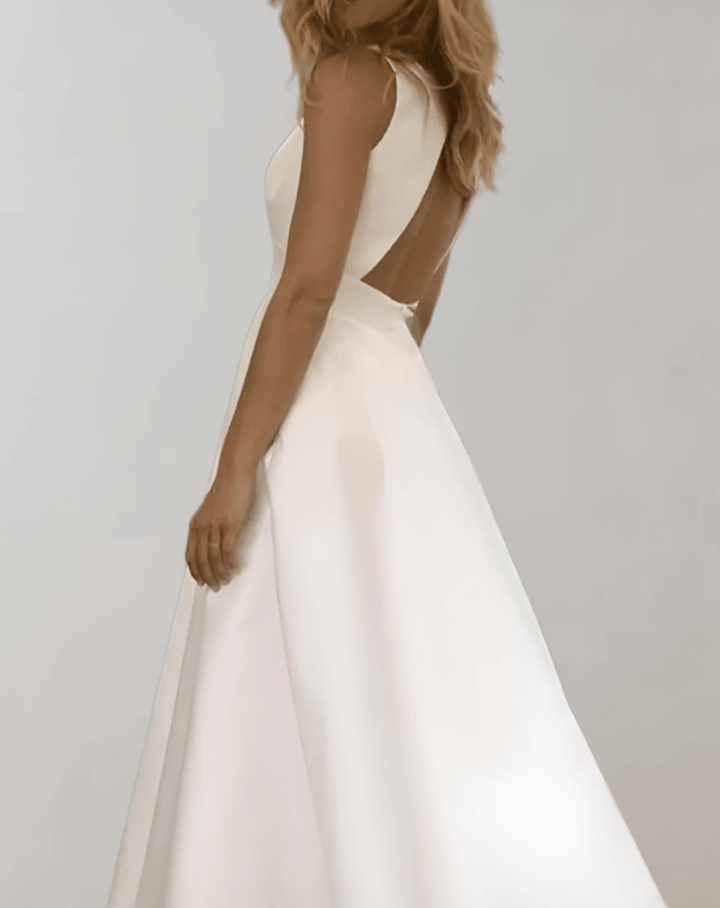 Mune Fashion | White Minimalist Bridal Dress With Deep V-Neck And Pockets