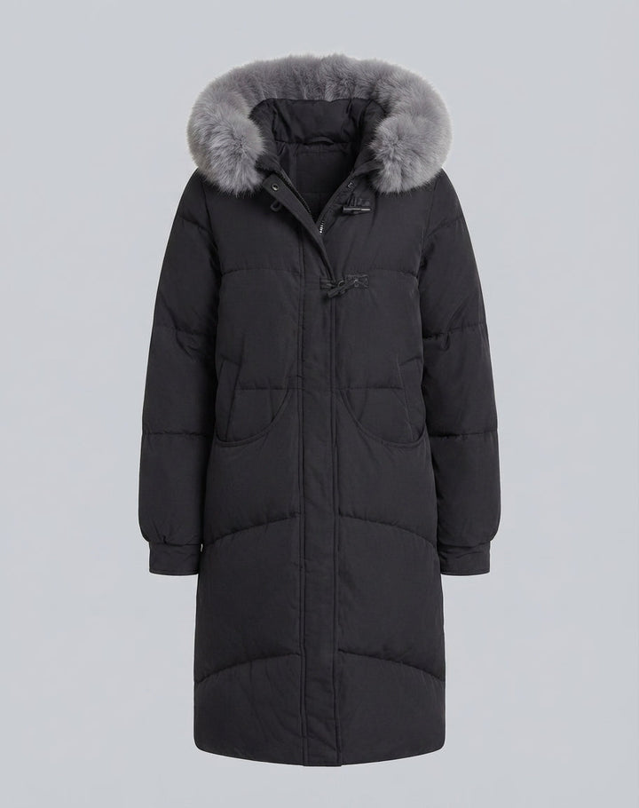 Women’s extra long oversized puffer coat with voluminous hood, removable faux fur trim, and noise-reducing outer material