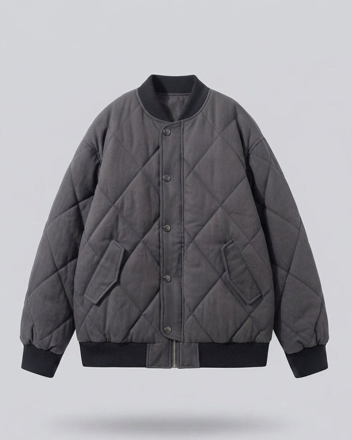 Women's nan dick quilted short jacket in bomber style with diamond stitching and concealed button placket