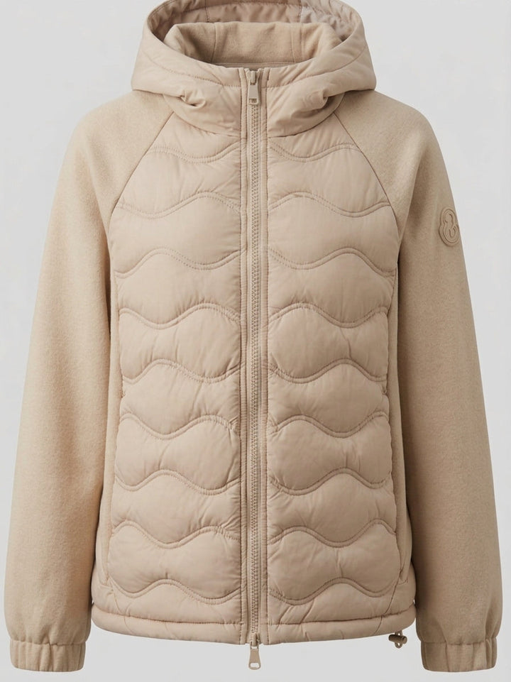Women's quilted hybrid hoodie jacket with fleece sleeves, elastic cuffs, and wave quilting