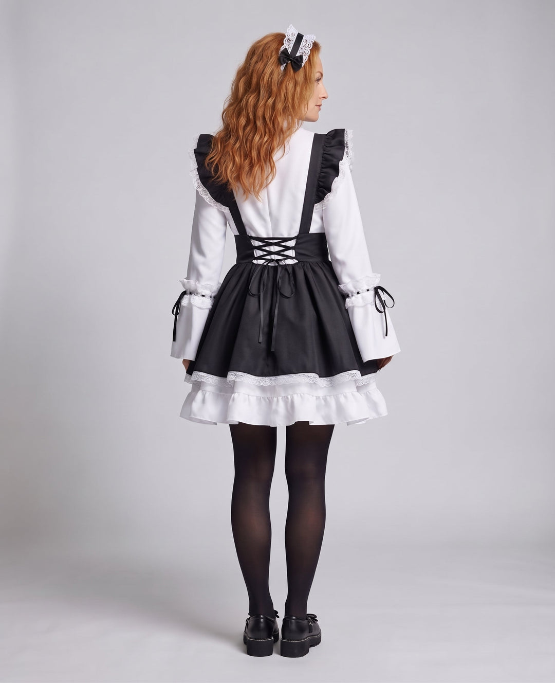 Ladies Costume as elegant maid with ruffles and bows Mune Fashion